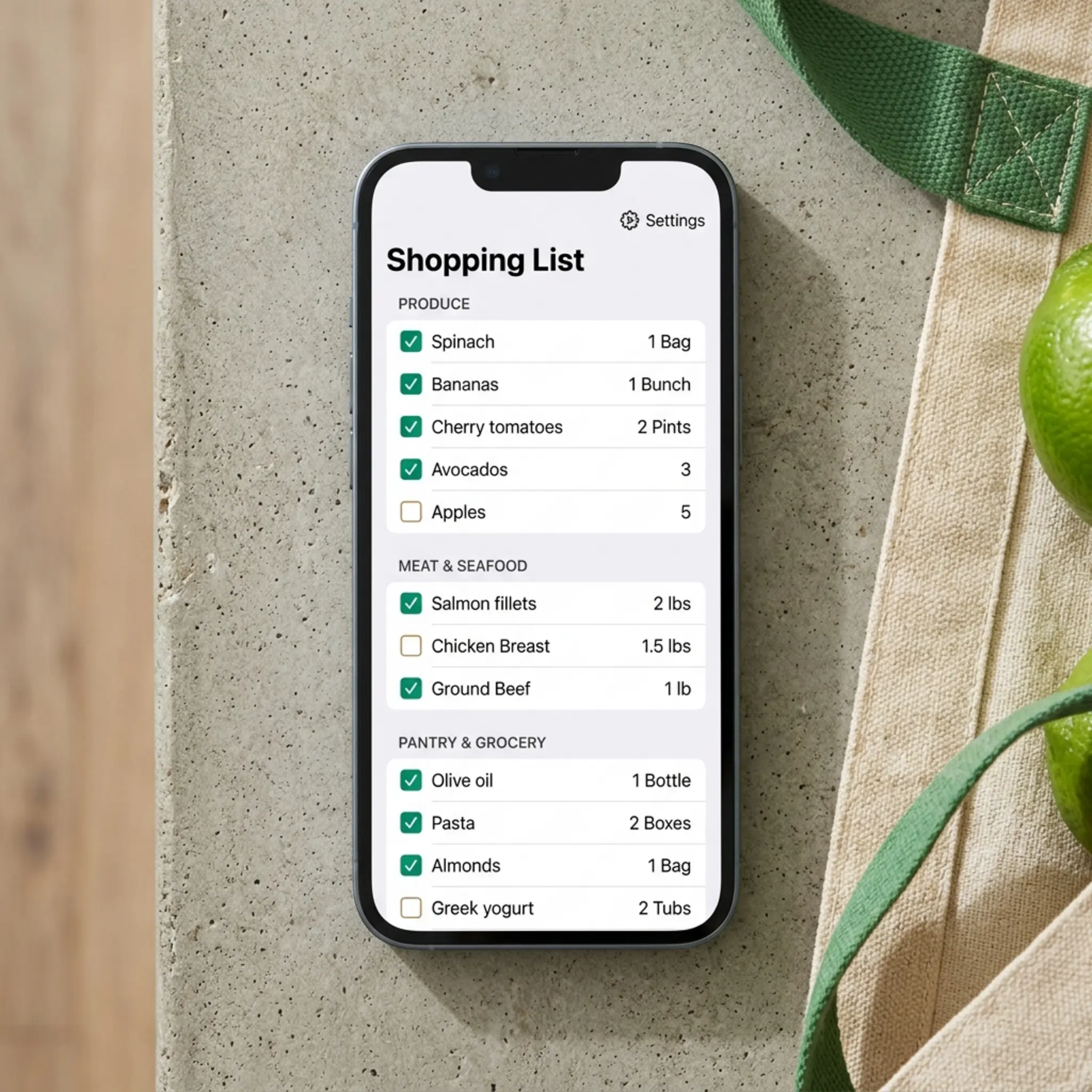 Phone showing a shopping list grouped by category with quantities